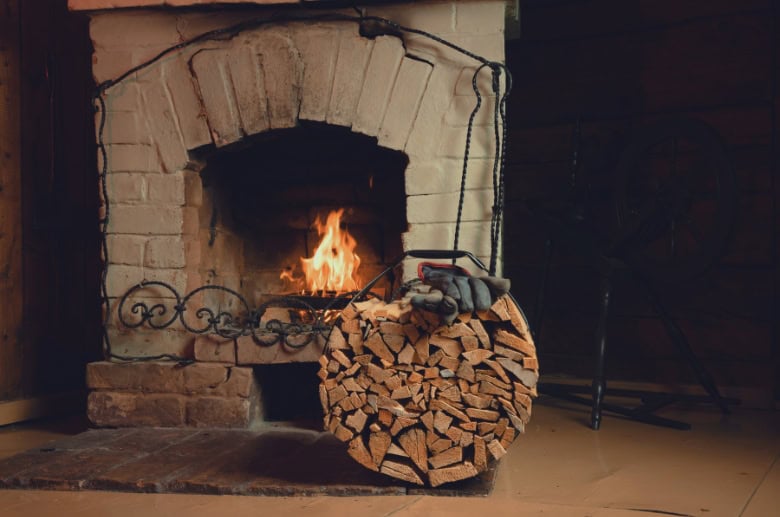 A traditional wood burning fireplace.