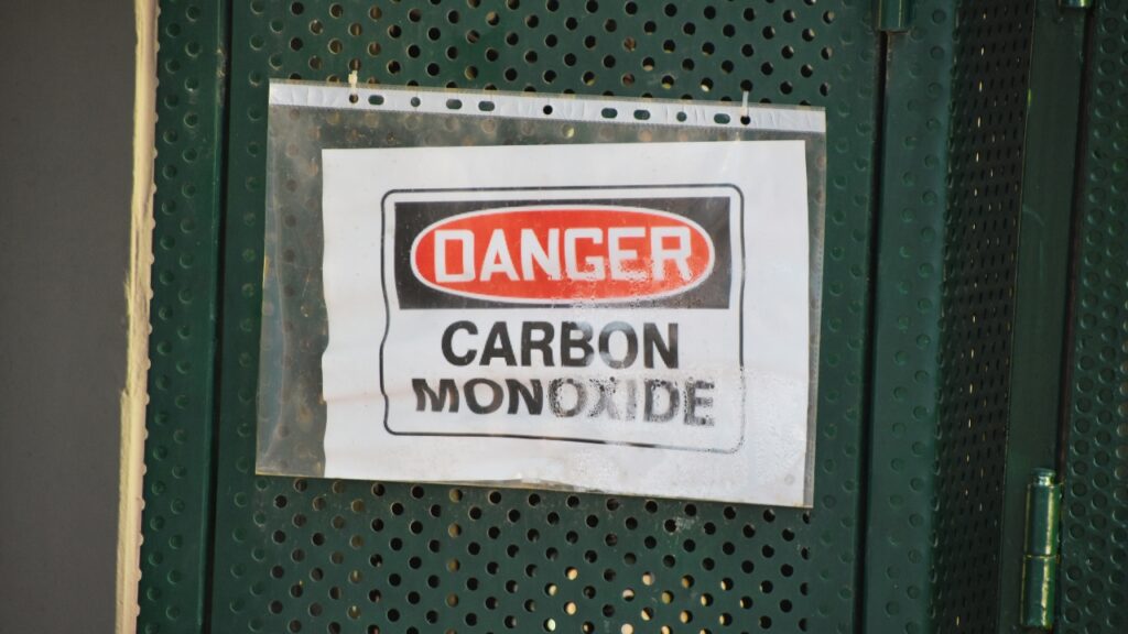 A carbon monoxide warning sign. Learn how to check your fireplace for Carbon Monoxide.