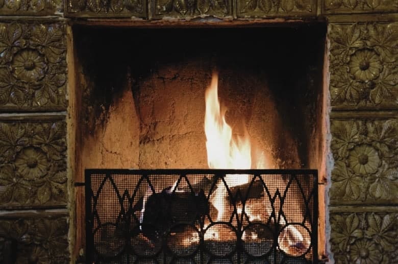 A fireplace with a bit of moisture. It is one of the signs of a spalling chimney.