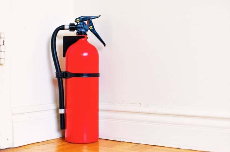 A fire extinguisher. It should be ready when there is an installed Wood Stove in Basement.