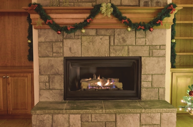 A gas fireplace insert. These have different steps for a Gas Fireplace Conversion.