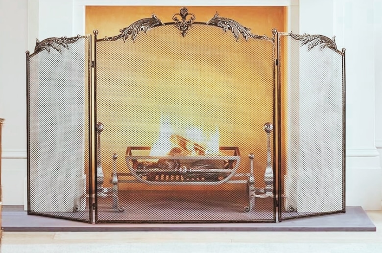 A mesh fireplace screen.