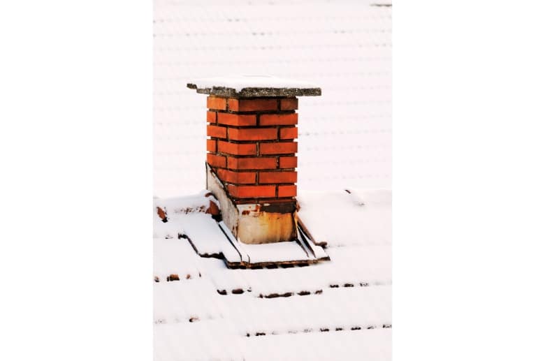 Snow on a chimney.