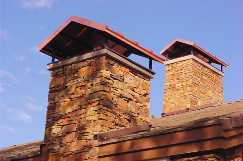 A chimney cap on two chimneys.