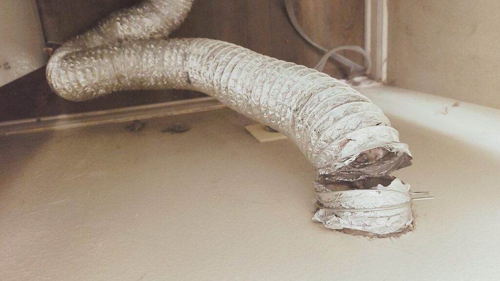 A broken dryer hose vent. Know how to do a dryer vent hose repair.