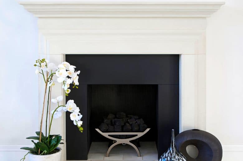 rebuild fireplace in a cast limestone style