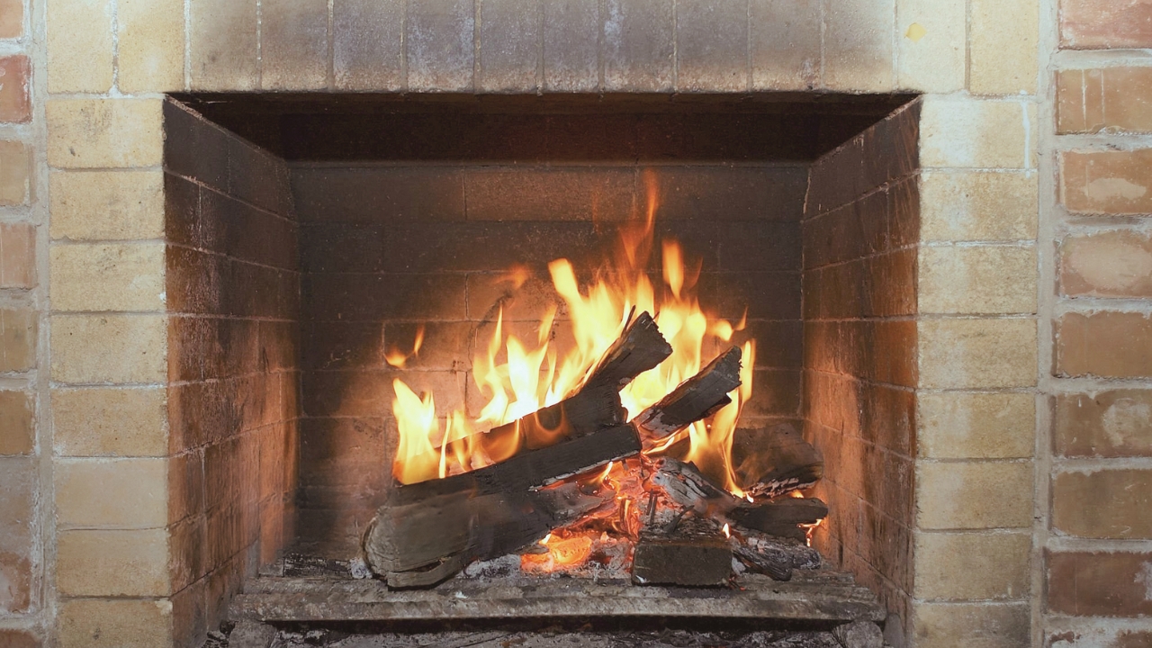 A brick fireplace with soot. Know how to clean fireplace brick soot.