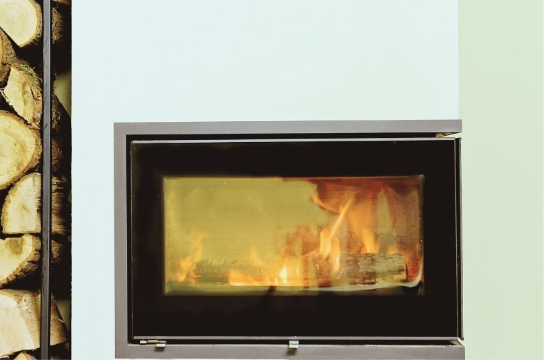 A wood burning fireplace insert.